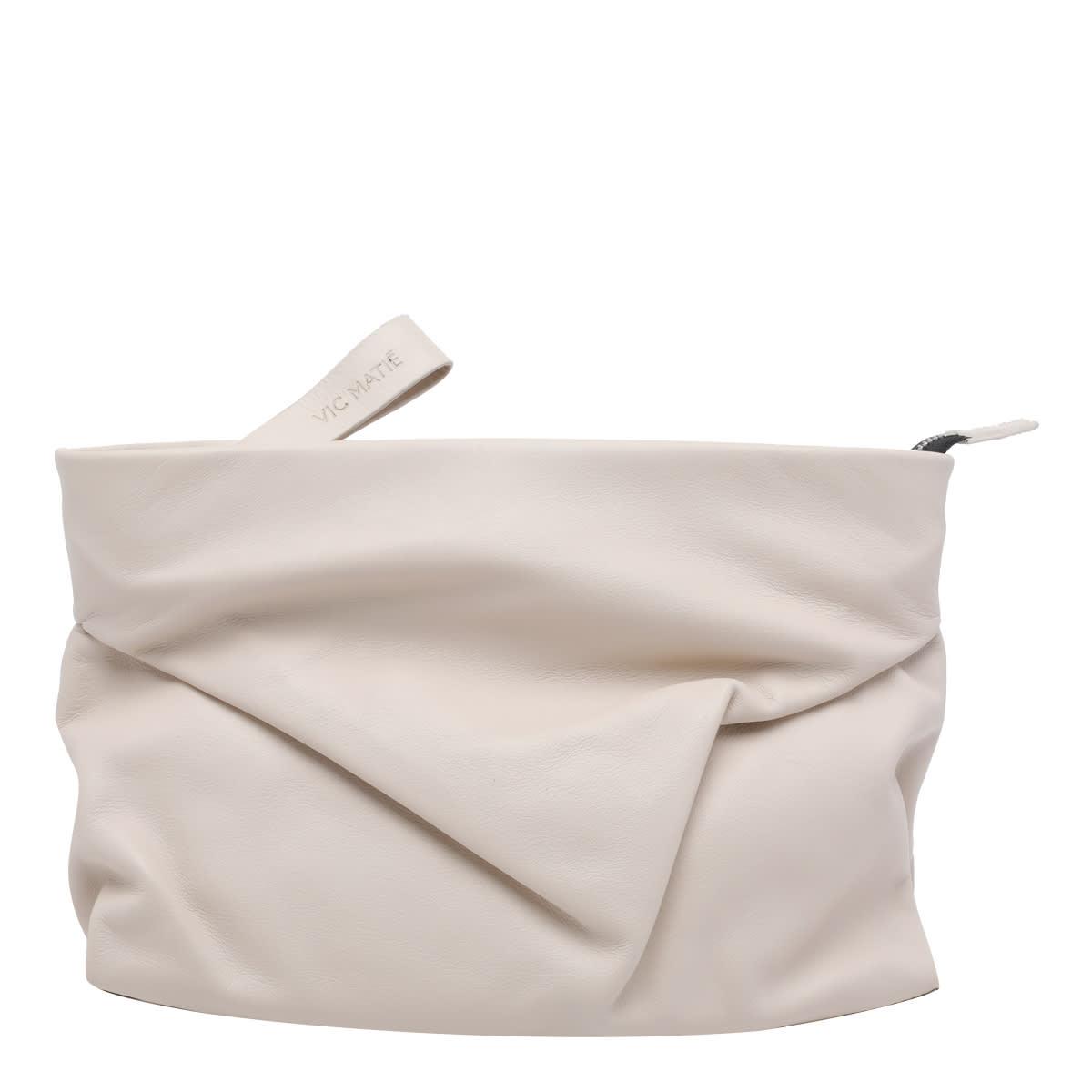 vic matié travel shoulder bag