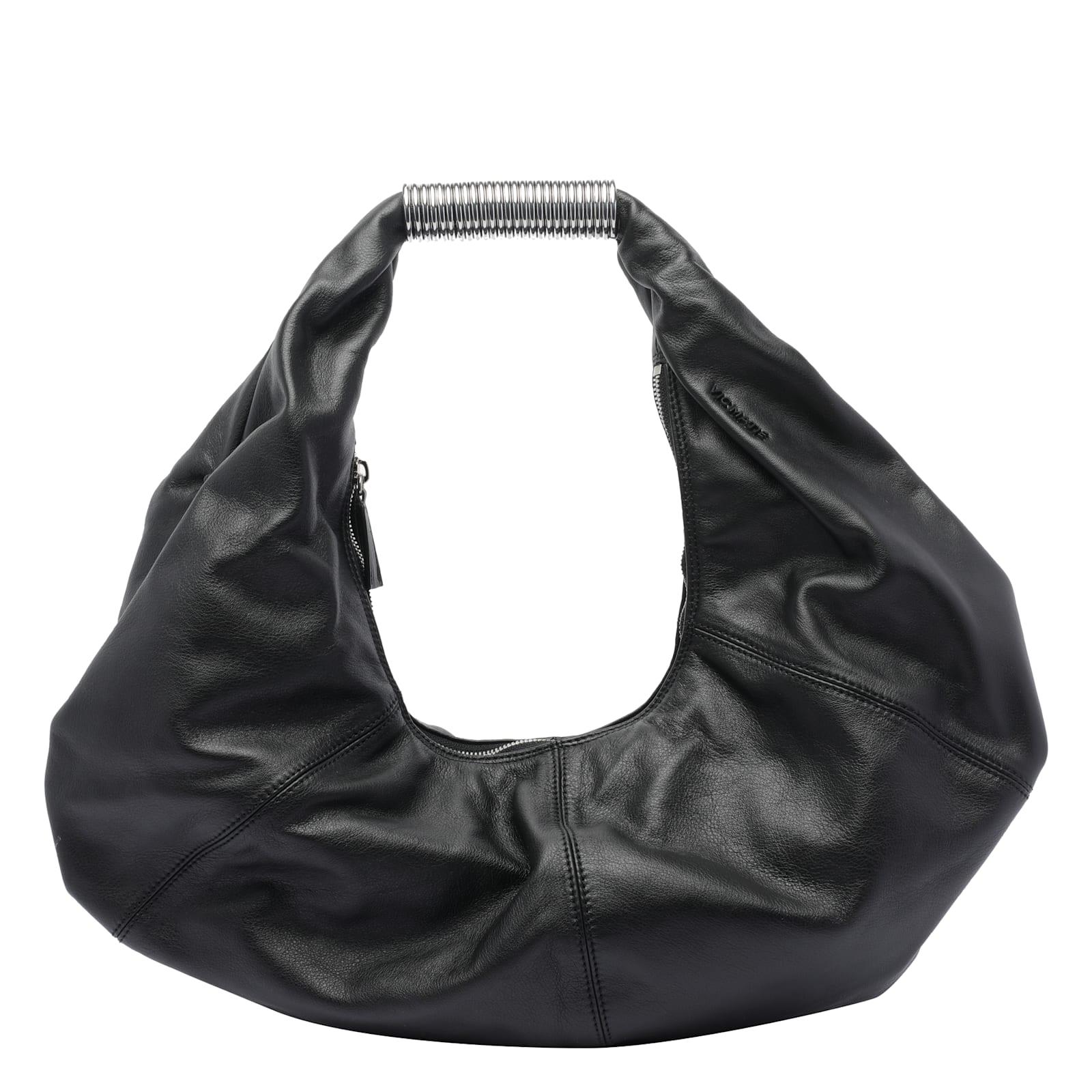 vic matié travel shoulder bag