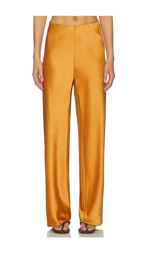 vince high waist satin bias pant in orange.