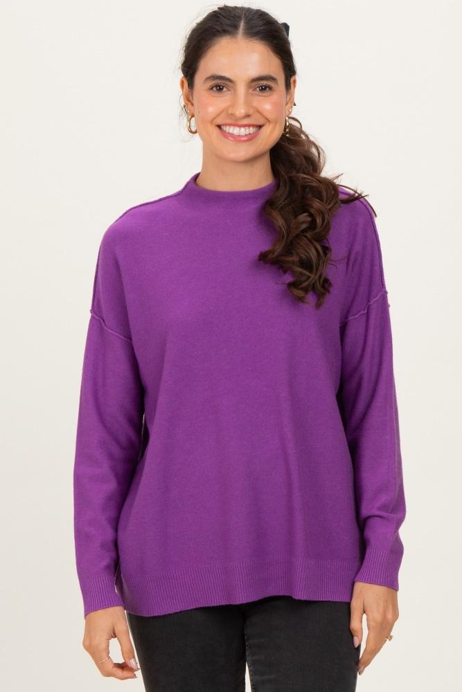 violet mock neck exposed seam sweater