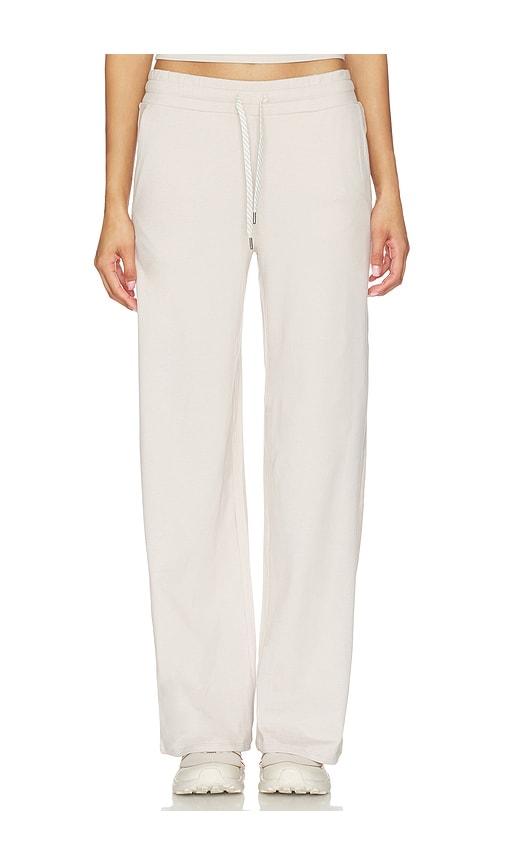 vuori halo essential wide leg pants in beige.