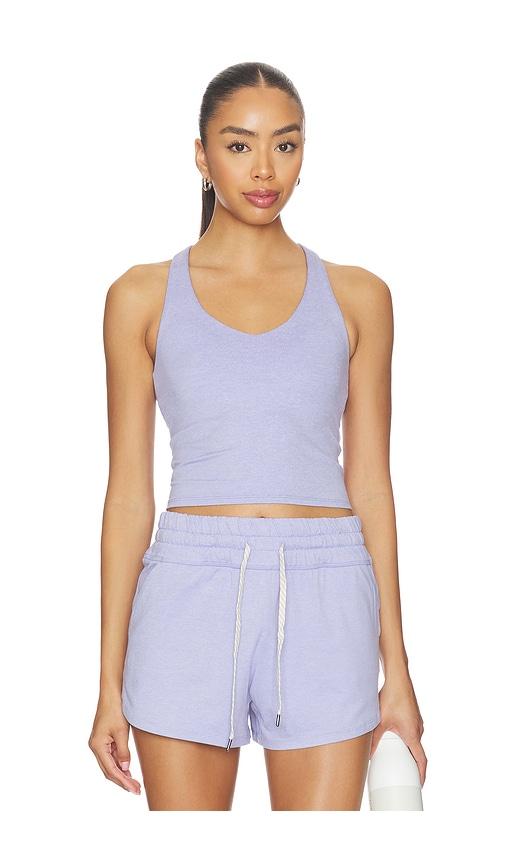 vuori halo performance crop tank in purple.