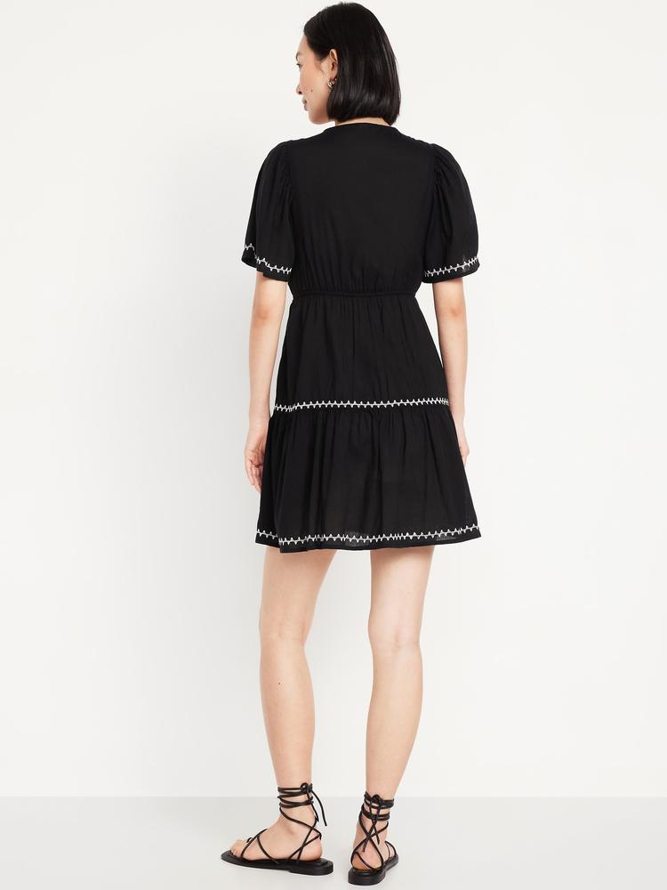 waist-defined embroidered mini dress