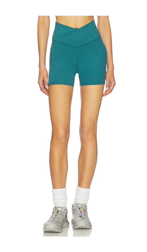 wellbeing + beingwell flowwell callista crossover 4 inch short in teal.