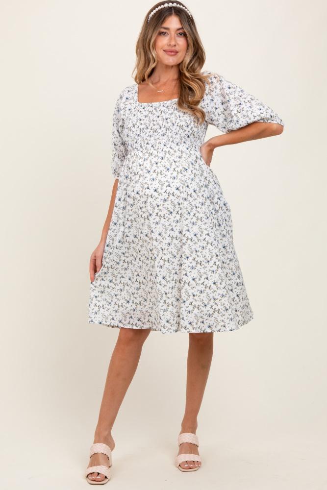 white floral smocked maternity midi dress