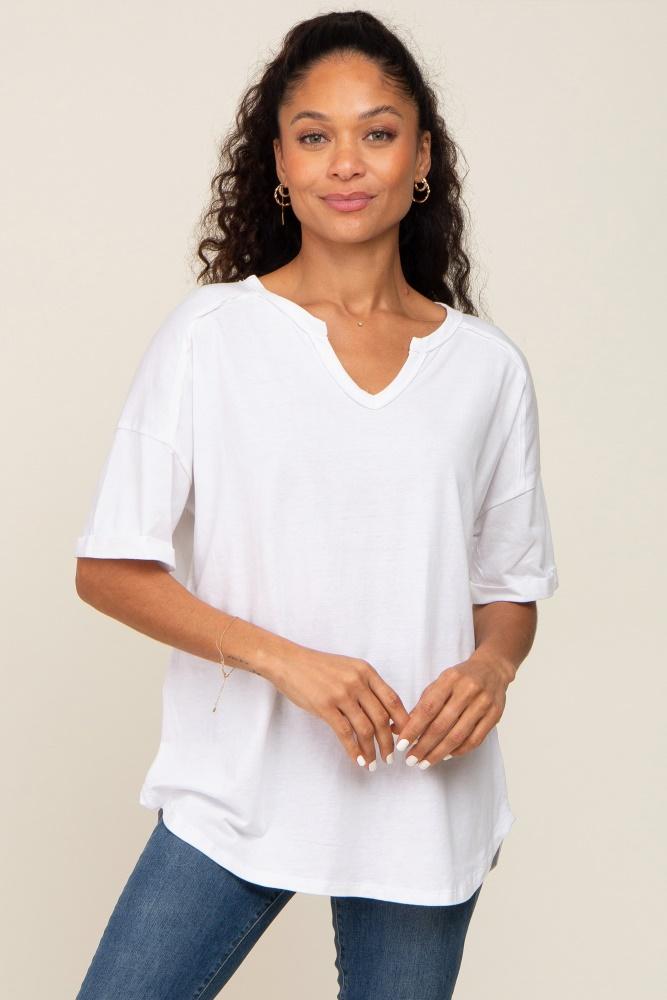 white oversized v-neck cuffed short sleeve tee