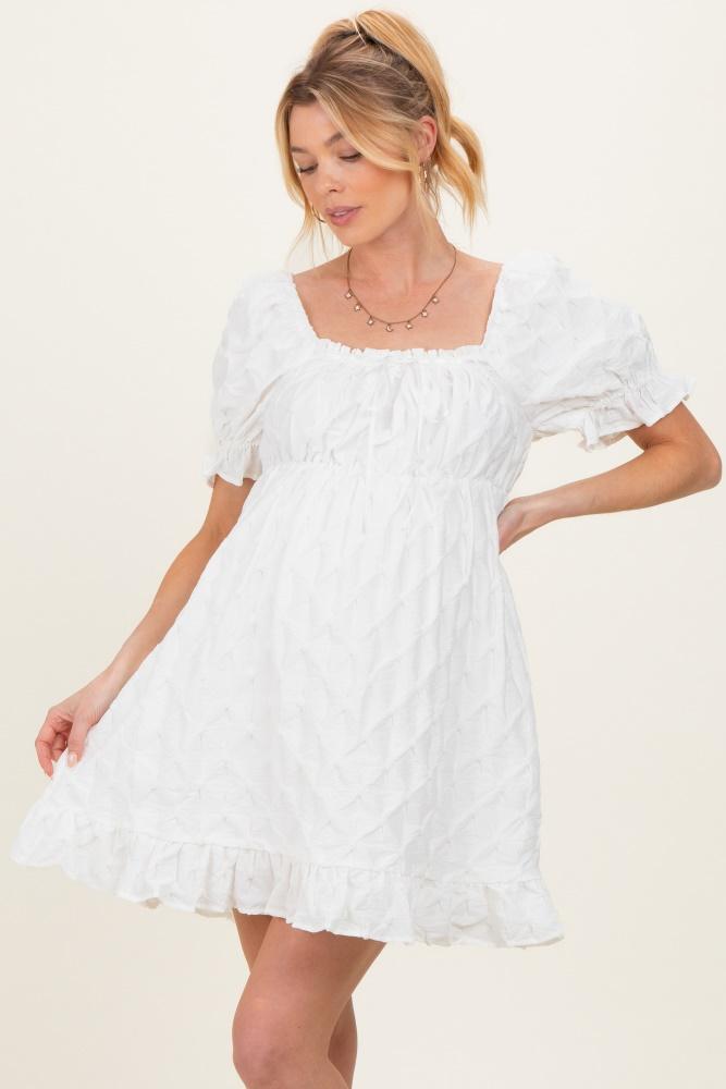 white textured puff sleeve maternity dress
