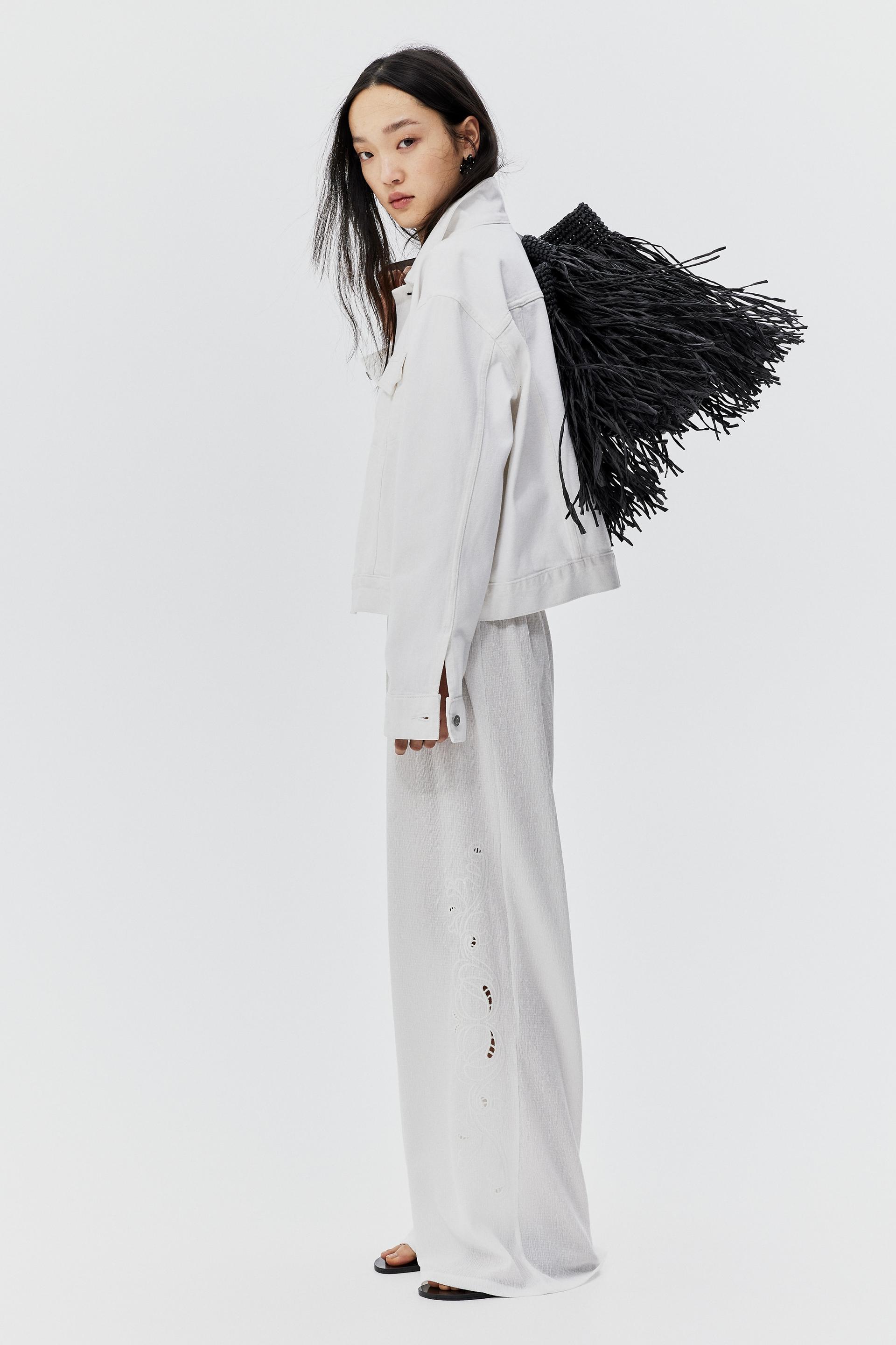 wide-leg pants with eyelet embroidery