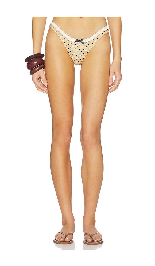 with jean jeanie polka dot bikini bottom in beige.