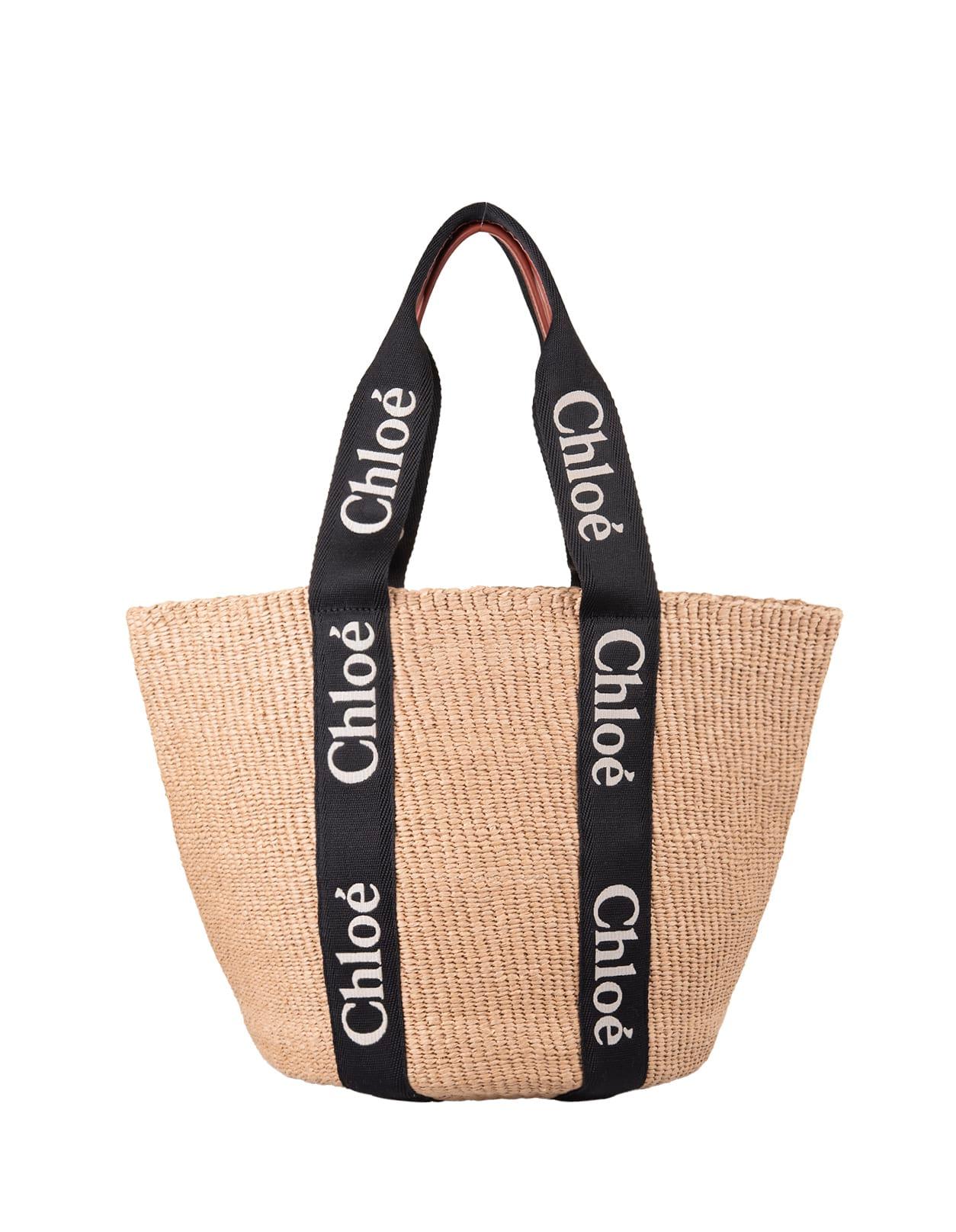 woody large basket bag in raffia with black chloé ribbons