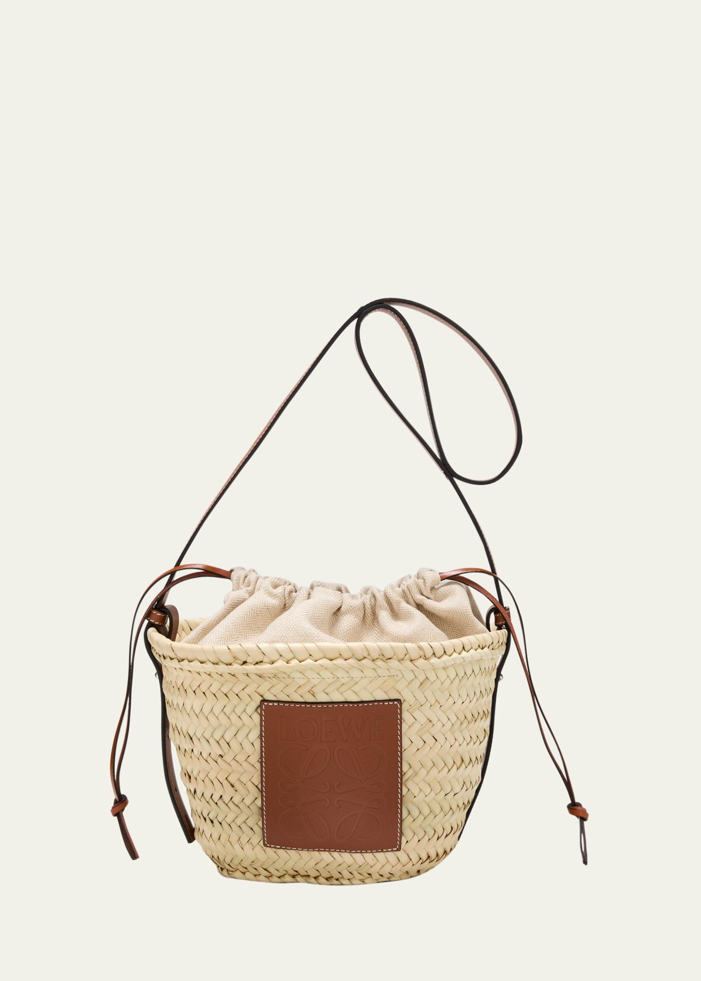 x paula’s ibiza basket bucket bag in palm leaf with drawstring pouch and leather strap