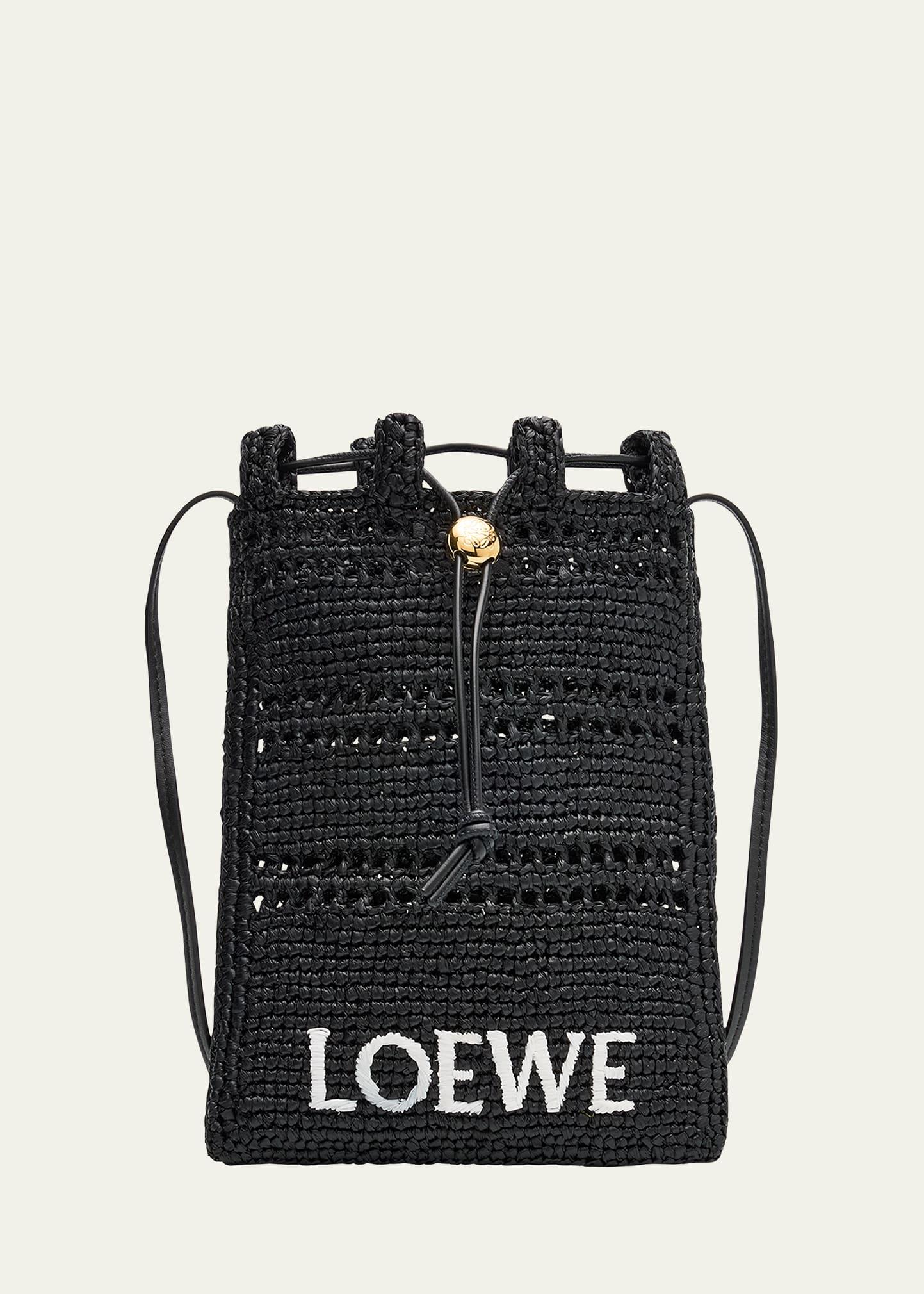 x paula’s ibiza drawstring pocket crossbody bag in raffia
