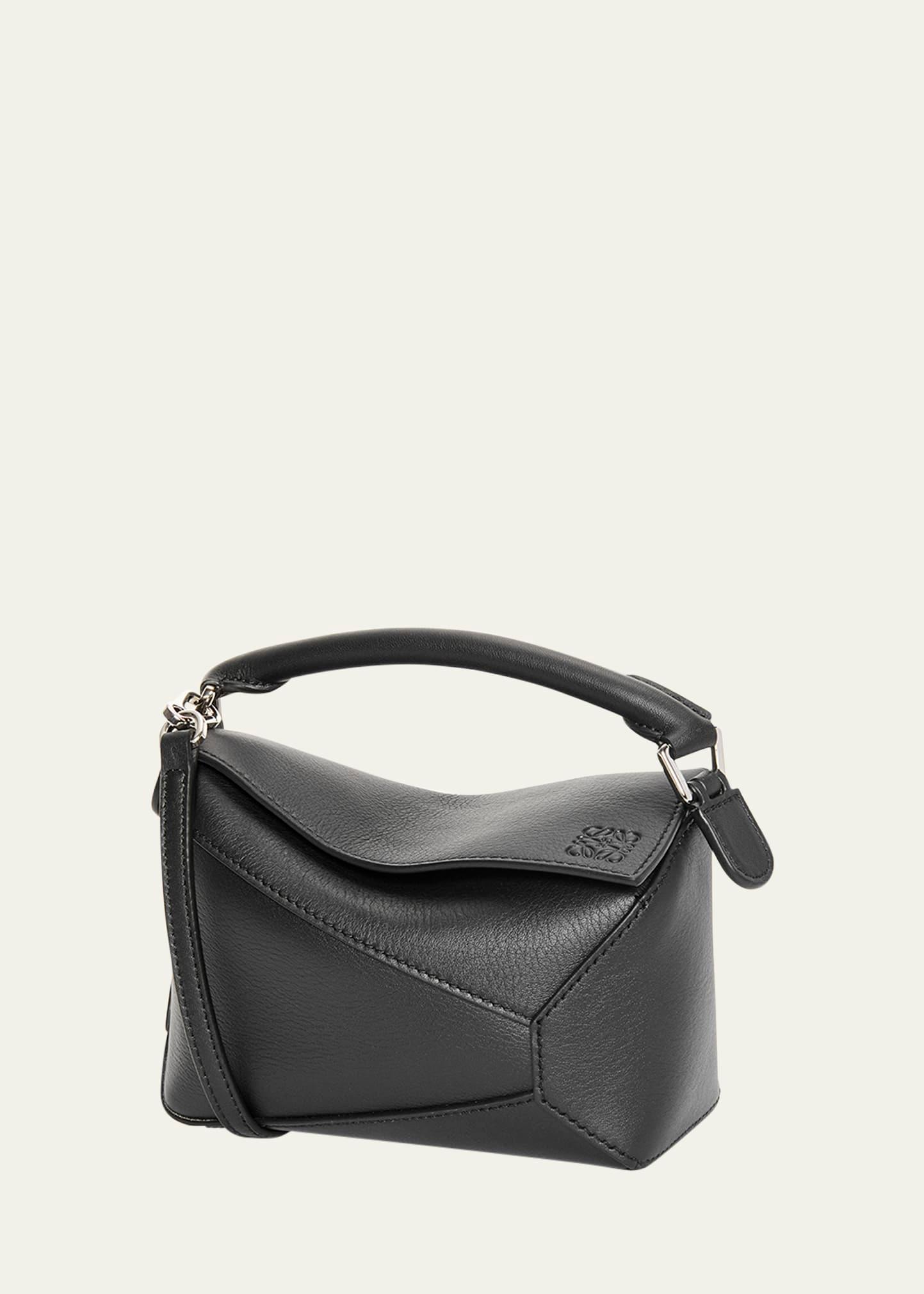 x paula's ibiza puzzle edge mini top-handle bag in leather