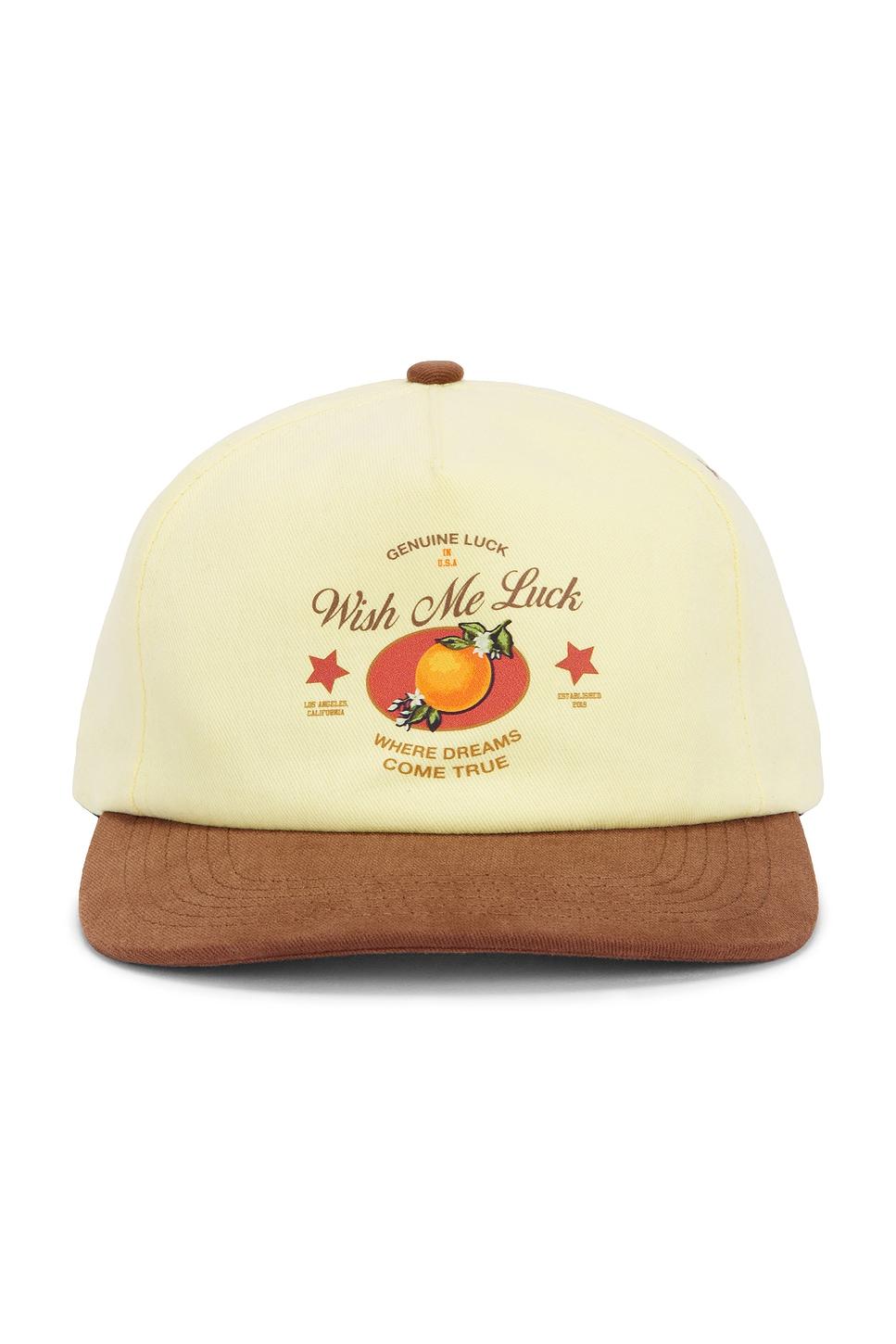 x revolve orange luck cap