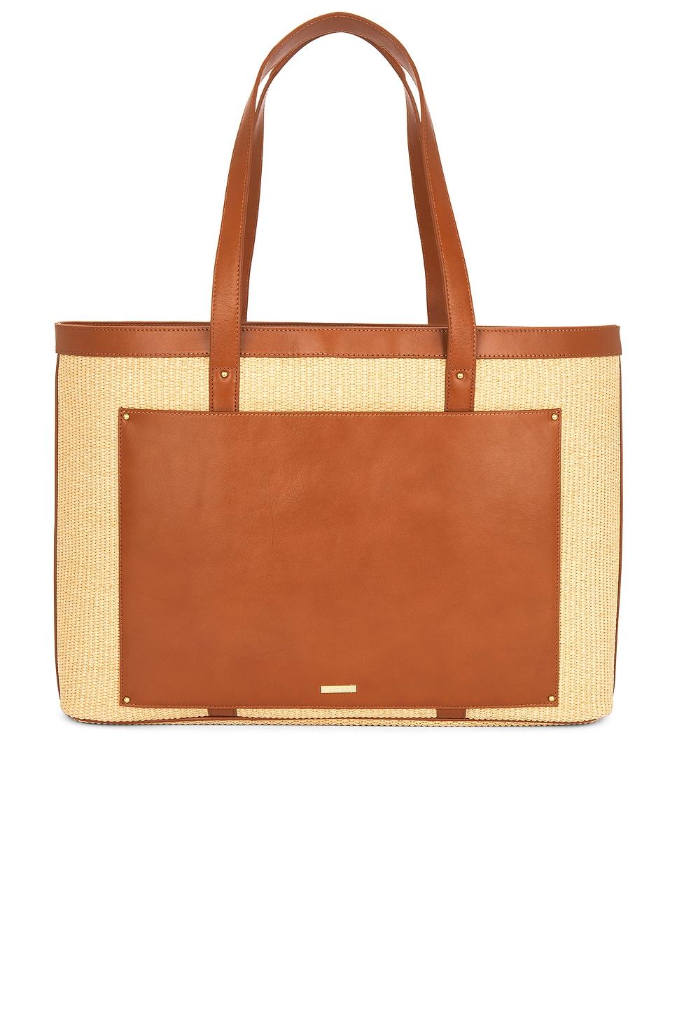 x revolve the udine raffia tote