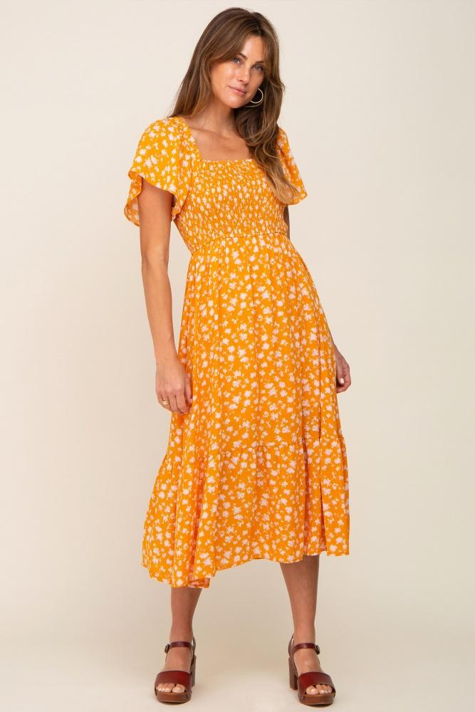 yellow floral smocked midi dress