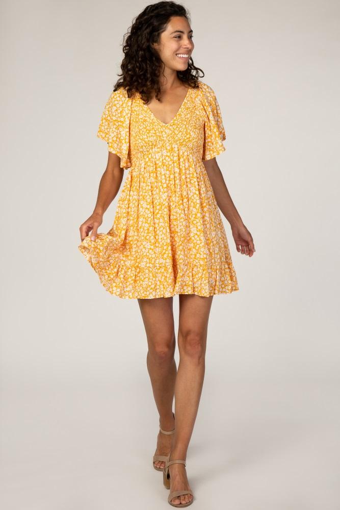 yellow floral smocked ruffle dress