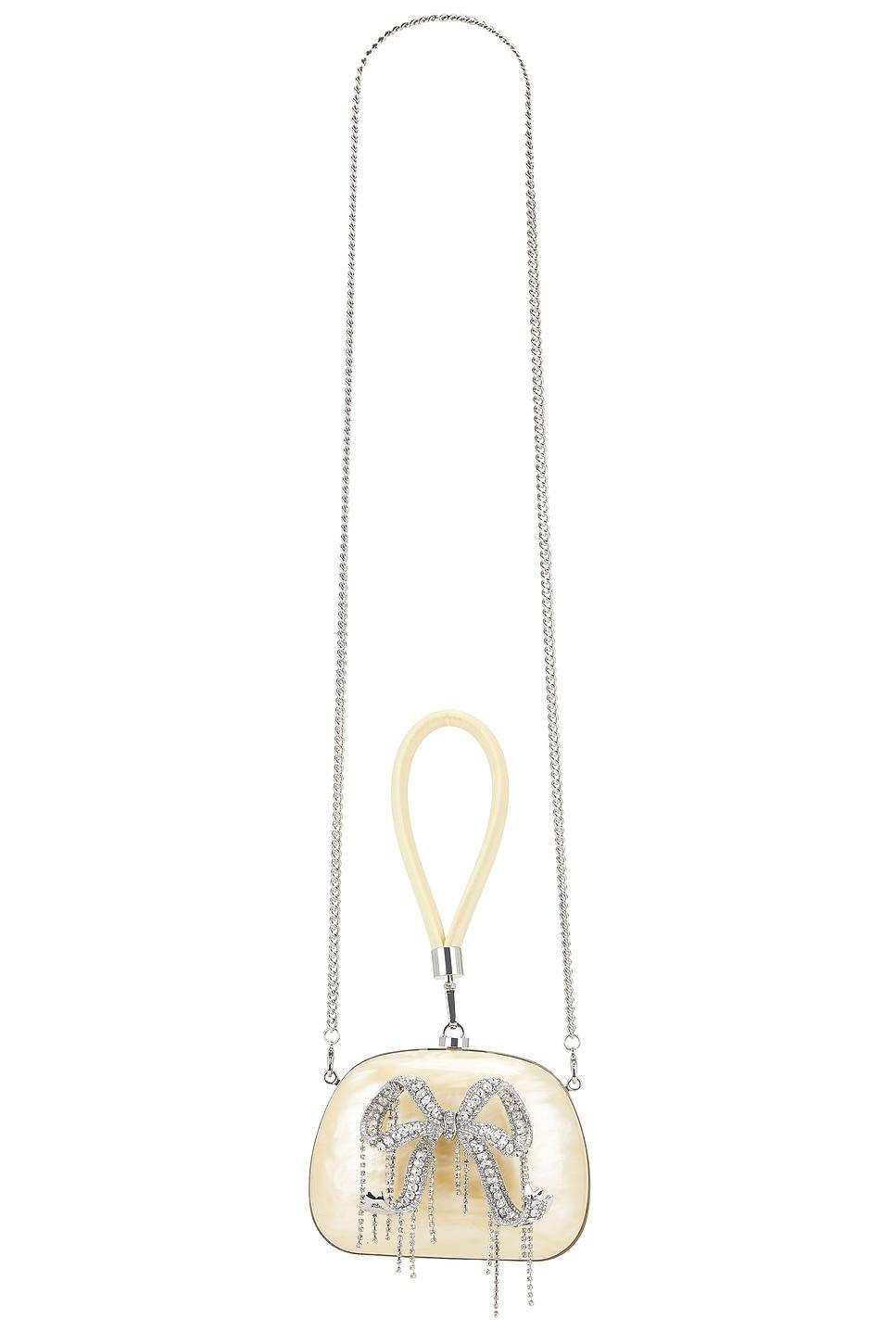 yellow pearl top handle clutch bag