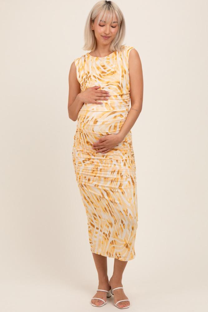 yellow printed ruched sleeveless maternity midi dress