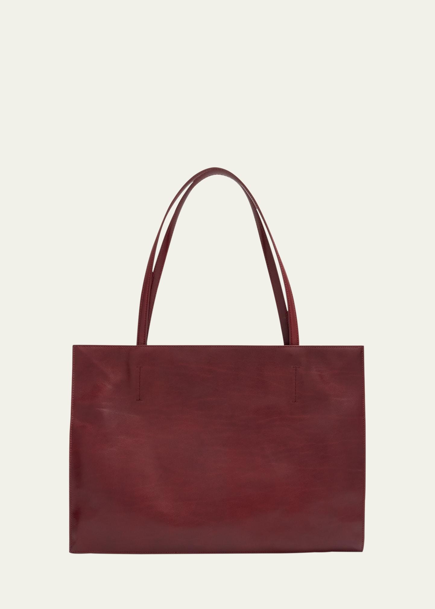 yumi leather sling tote bag