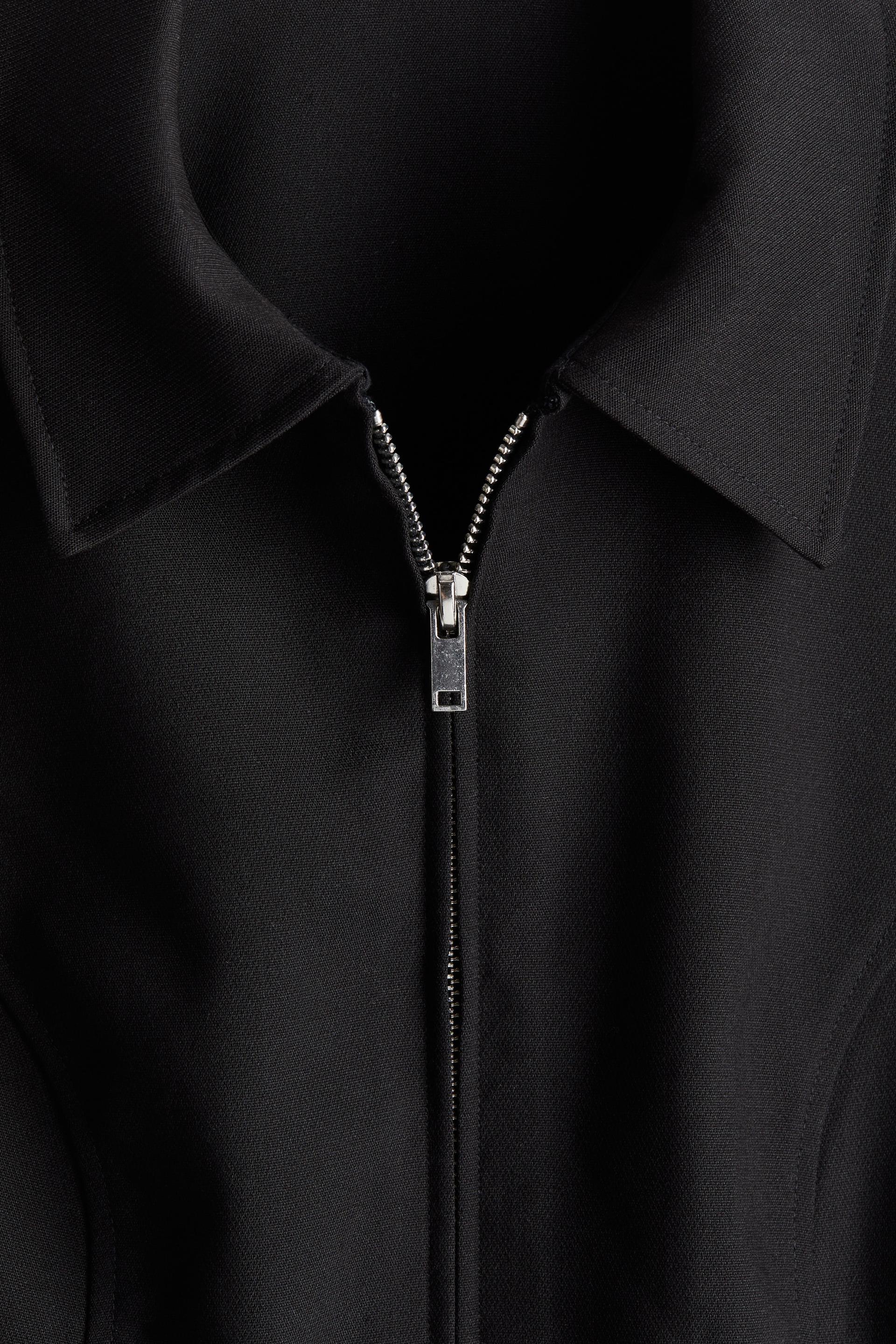 zip-front sleeveless top with collar